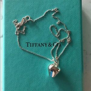 Tiffany & Co. silver apple charm.